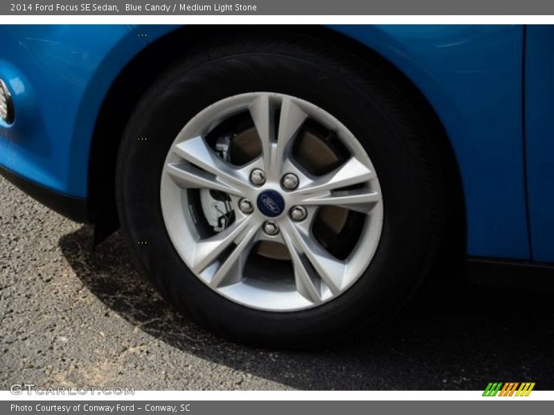 Blue Candy / Medium Light Stone 2014 Ford Focus SE Sedan