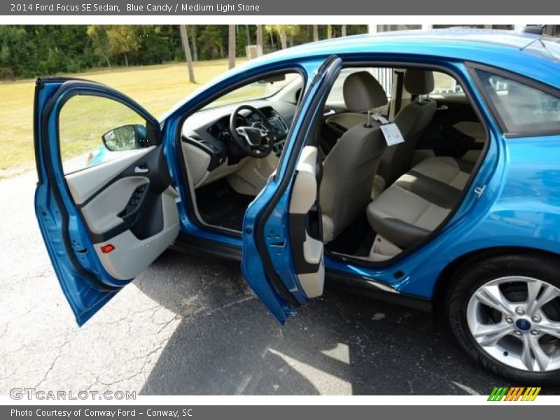 Blue Candy / Medium Light Stone 2014 Ford Focus SE Sedan