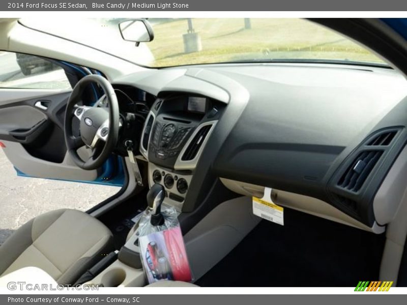 Blue Candy / Medium Light Stone 2014 Ford Focus SE Sedan