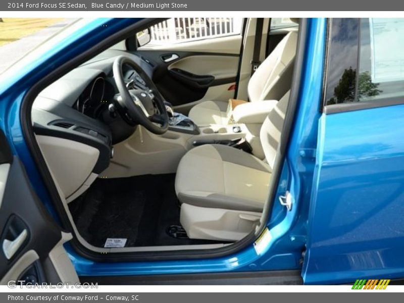 Blue Candy / Medium Light Stone 2014 Ford Focus SE Sedan