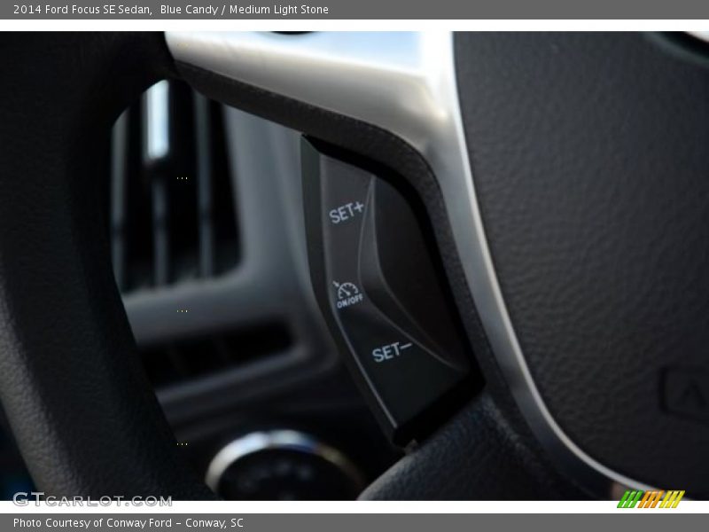 Blue Candy / Medium Light Stone 2014 Ford Focus SE Sedan