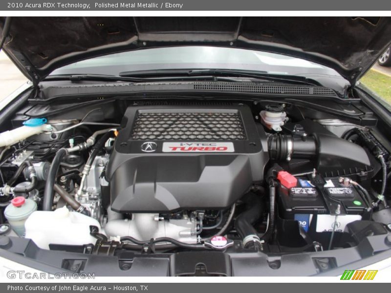 Polished Metal Metallic / Ebony 2010 Acura RDX Technology