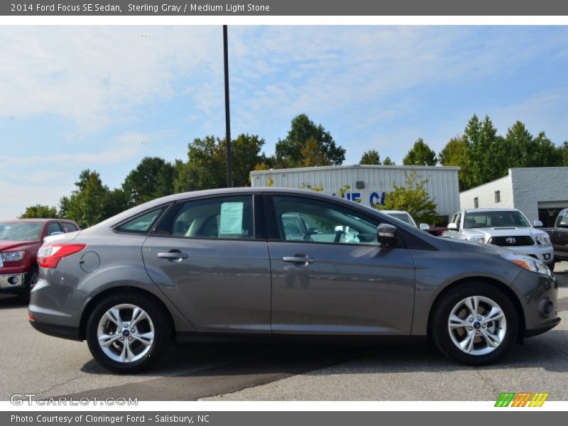 Sterling Gray / Medium Light Stone 2014 Ford Focus SE Sedan