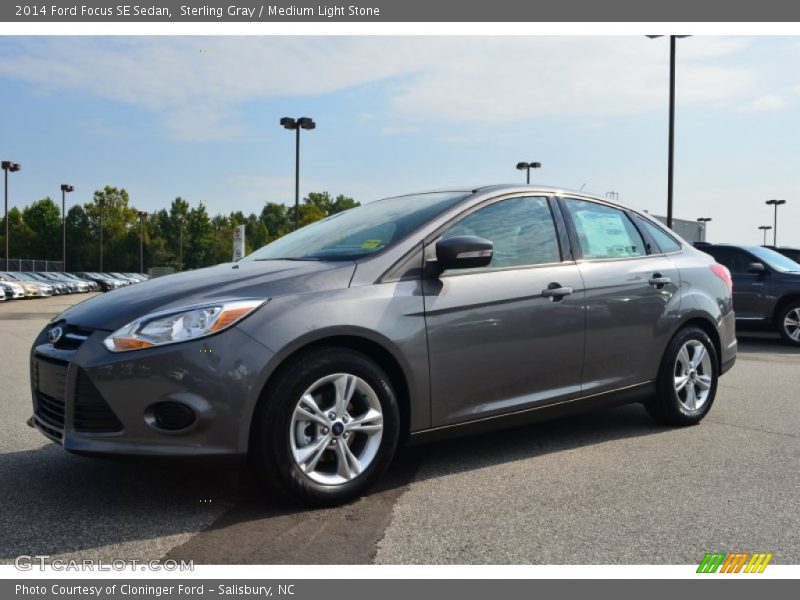 Sterling Gray / Medium Light Stone 2014 Ford Focus SE Sedan