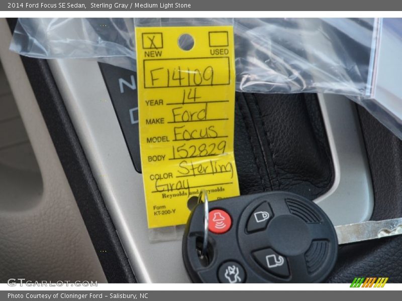 Sterling Gray / Medium Light Stone 2014 Ford Focus SE Sedan
