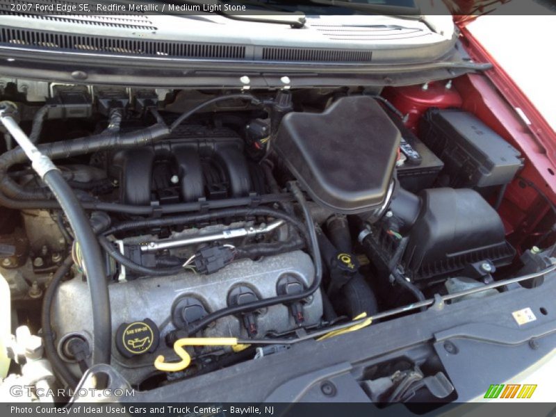Redfire Metallic / Medium Light Stone 2007 Ford Edge SE