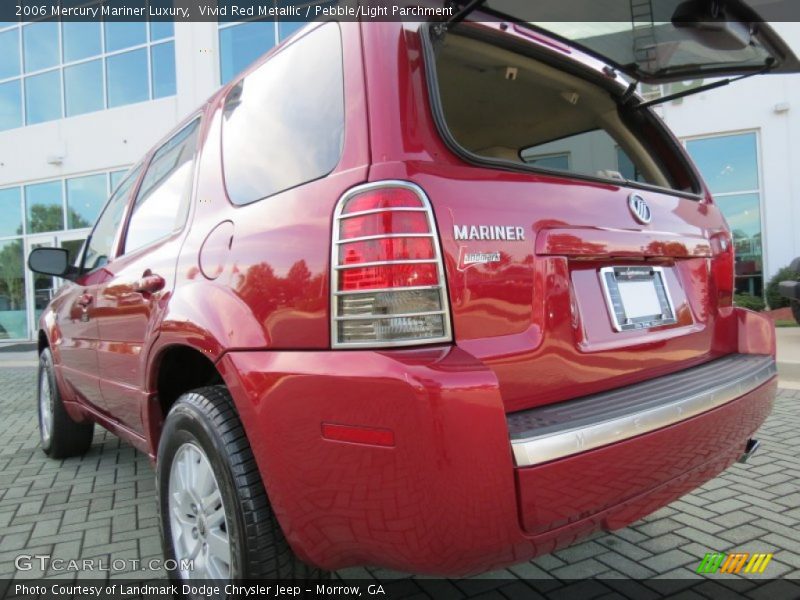 Vivid Red Metallic / Pebble/Light Parchment 2006 Mercury Mariner Luxury