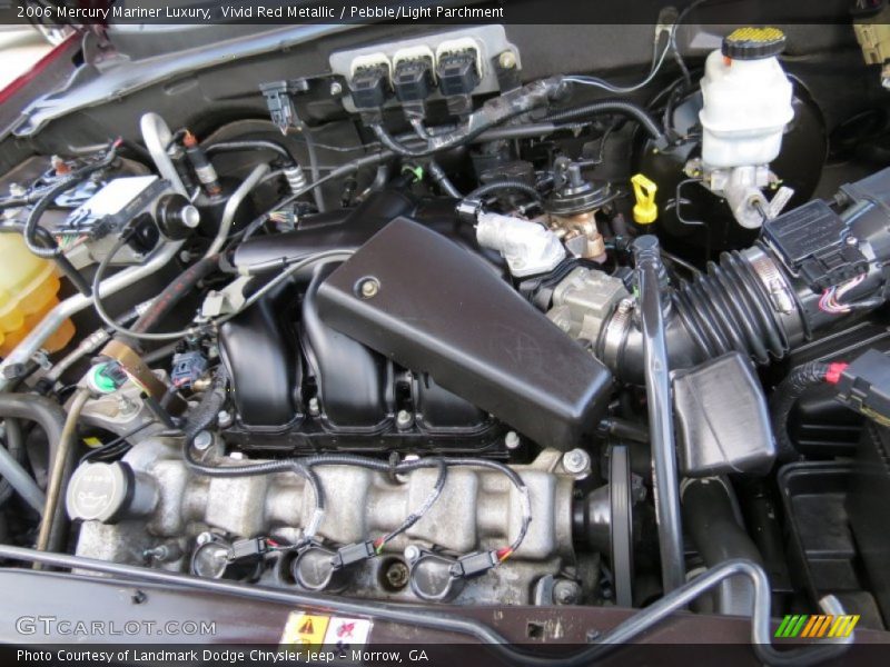 Vivid Red Metallic / Pebble/Light Parchment 2006 Mercury Mariner Luxury