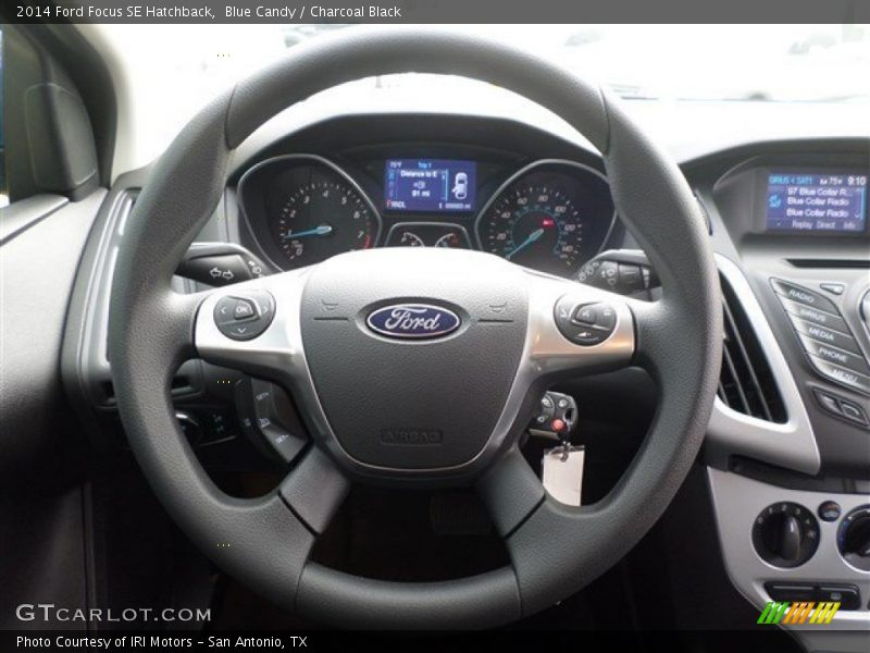 Blue Candy / Charcoal Black 2014 Ford Focus SE Hatchback