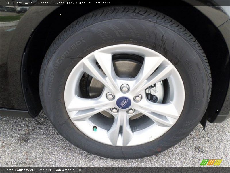 Tuxedo Black / Medium Light Stone 2014 Ford Focus SE Sedan