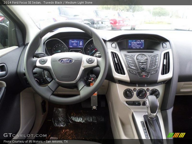 Tuxedo Black / Medium Light Stone 2014 Ford Focus SE Sedan