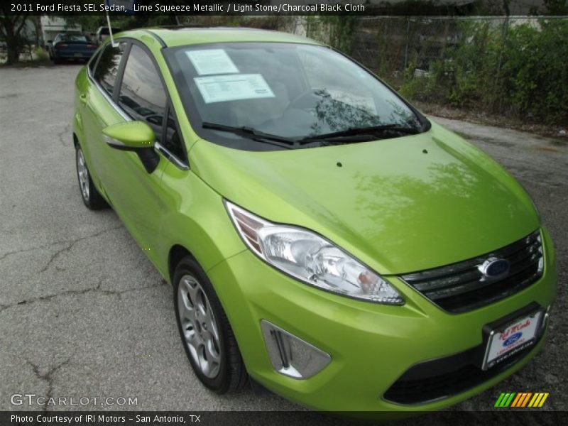 Lime Squeeze Metallic / Light Stone/Charcoal Black Cloth 2011 Ford Fiesta SEL Sedan