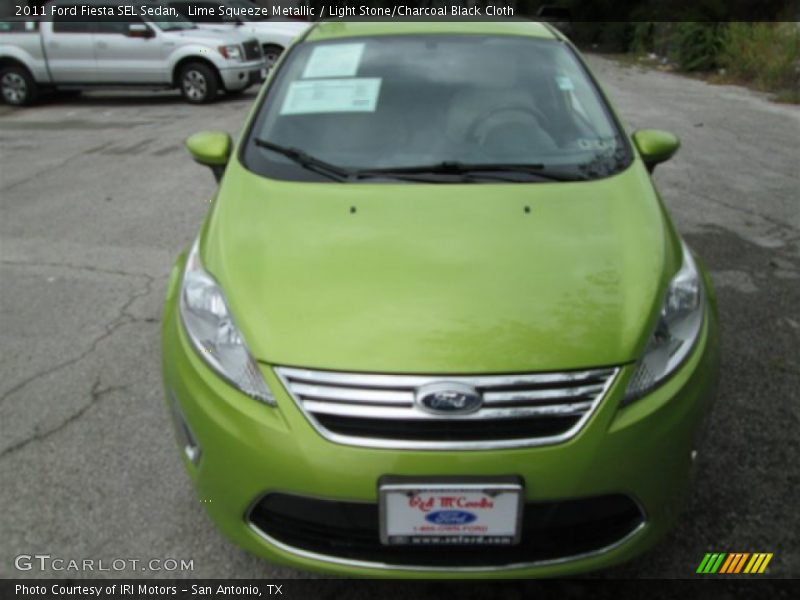 Lime Squeeze Metallic / Light Stone/Charcoal Black Cloth 2011 Ford Fiesta SEL Sedan