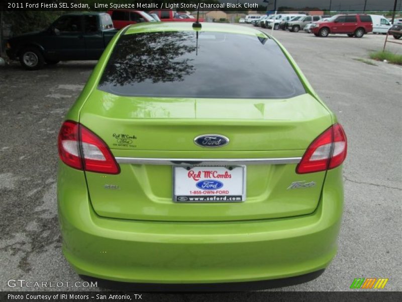 Lime Squeeze Metallic / Light Stone/Charcoal Black Cloth 2011 Ford Fiesta SEL Sedan