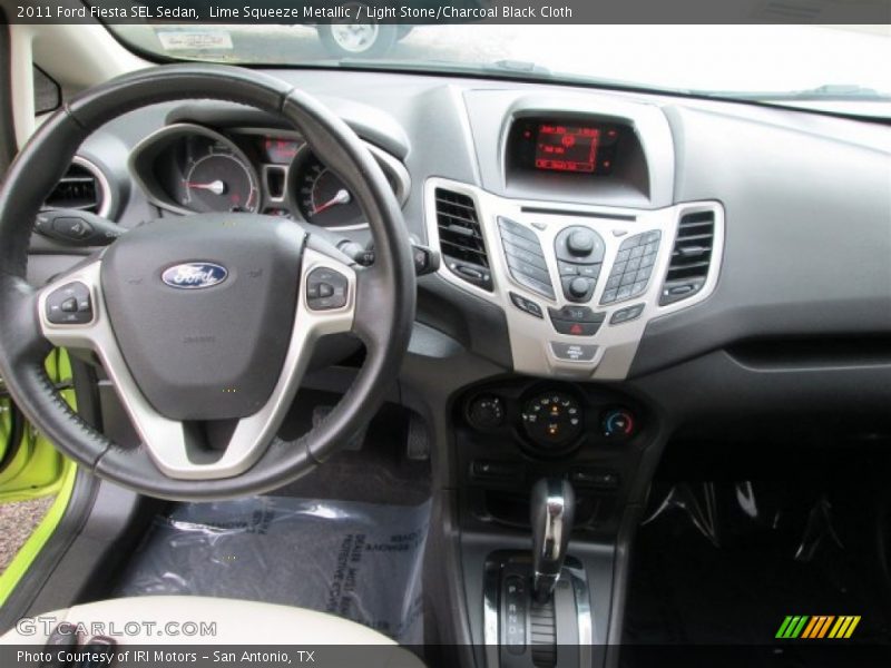 Lime Squeeze Metallic / Light Stone/Charcoal Black Cloth 2011 Ford Fiesta SEL Sedan