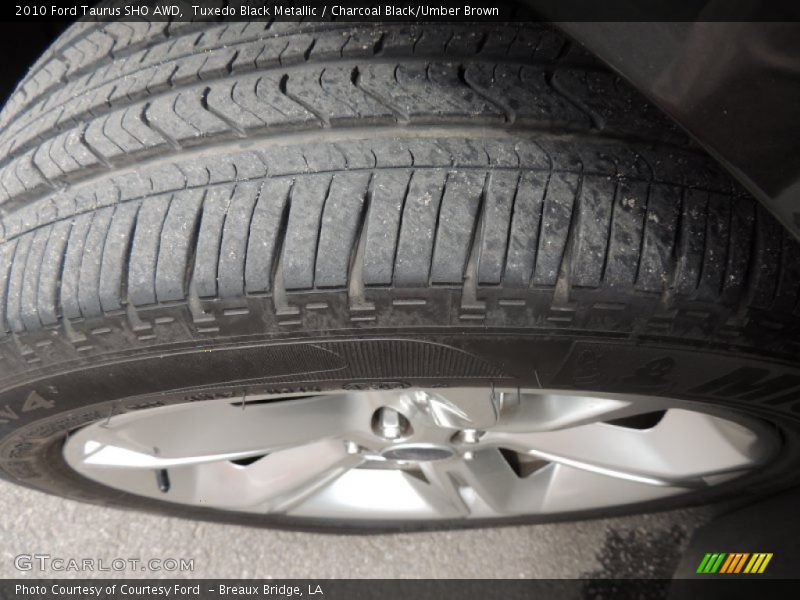 Tuxedo Black Metallic / Charcoal Black/Umber Brown 2010 Ford Taurus SHO AWD