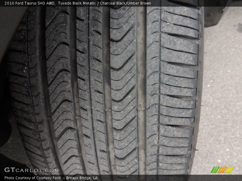 Tuxedo Black Metallic / Charcoal Black/Umber Brown 2010 Ford Taurus SHO AWD