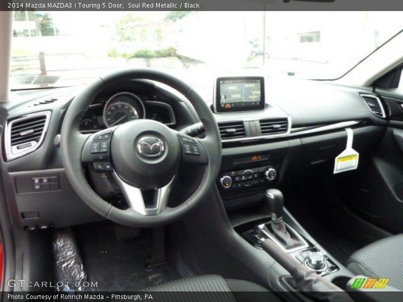 Dashboard of 2014 MAZDA3 i Touring 5 Door