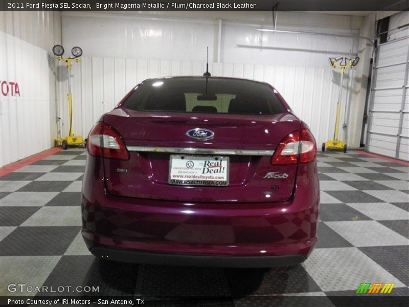 Bright Magenta Metallic / Plum/Charcoal Black Leather 2011 Ford Fiesta SEL Sedan