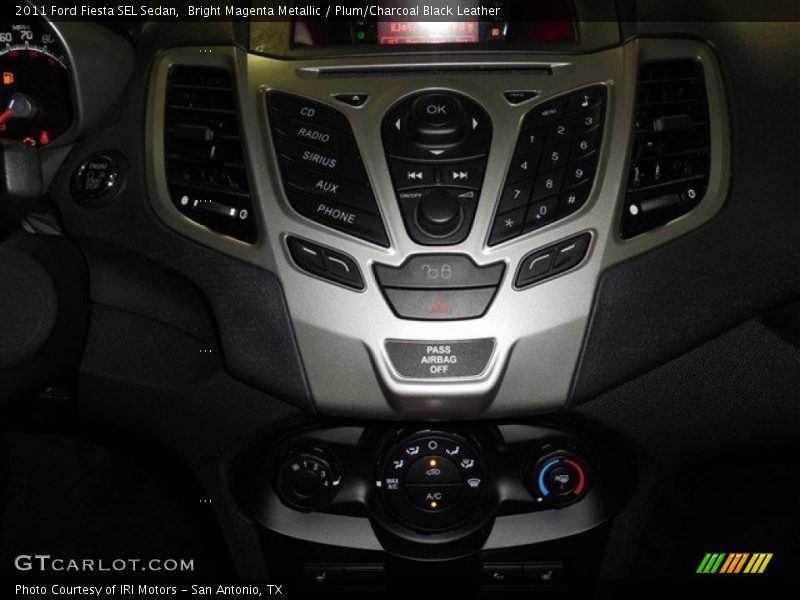 Bright Magenta Metallic / Plum/Charcoal Black Leather 2011 Ford Fiesta SEL Sedan