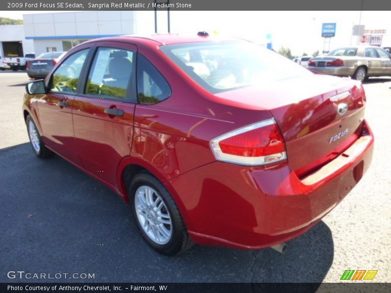 Sangria Red Metallic / Medium Stone 2009 Ford Focus SE Sedan