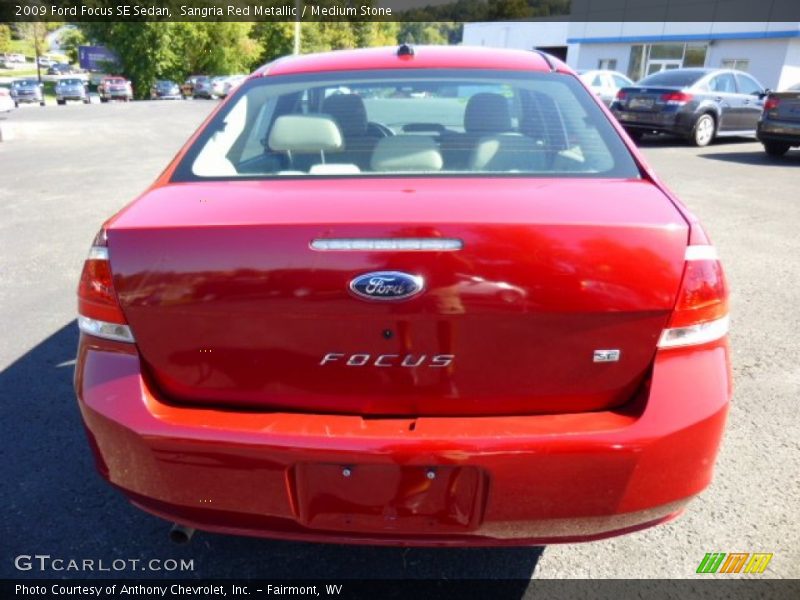 Sangria Red Metallic / Medium Stone 2009 Ford Focus SE Sedan