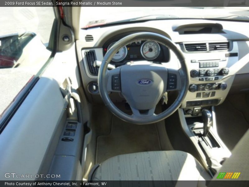 Sangria Red Metallic / Medium Stone 2009 Ford Focus SE Sedan