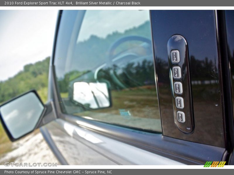 Brilliant Silver Metallic / Charcoal Black 2010 Ford Explorer Sport Trac XLT 4x4