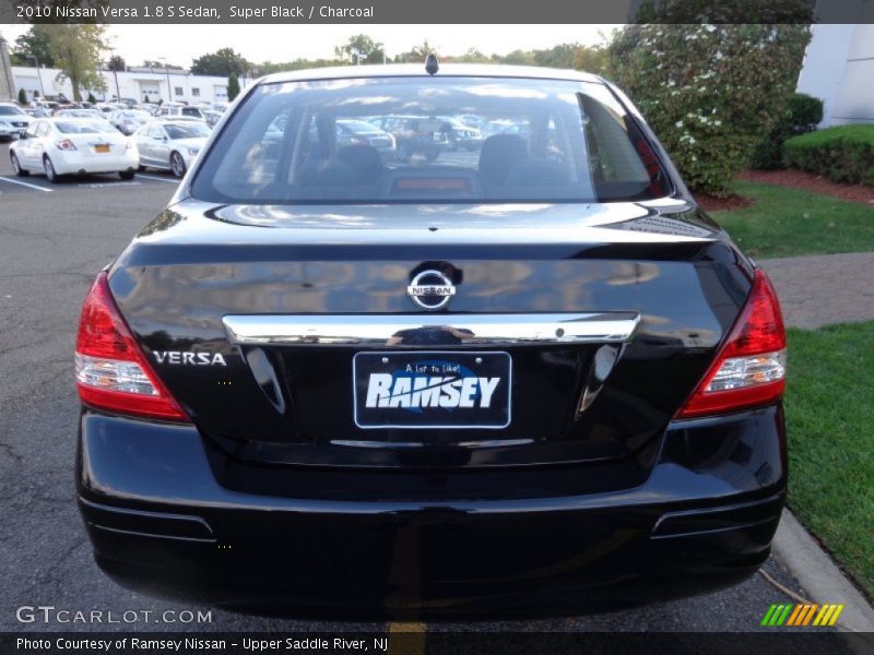 Super Black / Charcoal 2010 Nissan Versa 1.8 S Sedan