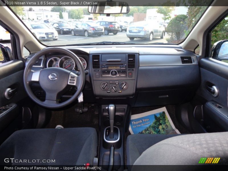 Super Black / Charcoal 2010 Nissan Versa 1.8 S Sedan