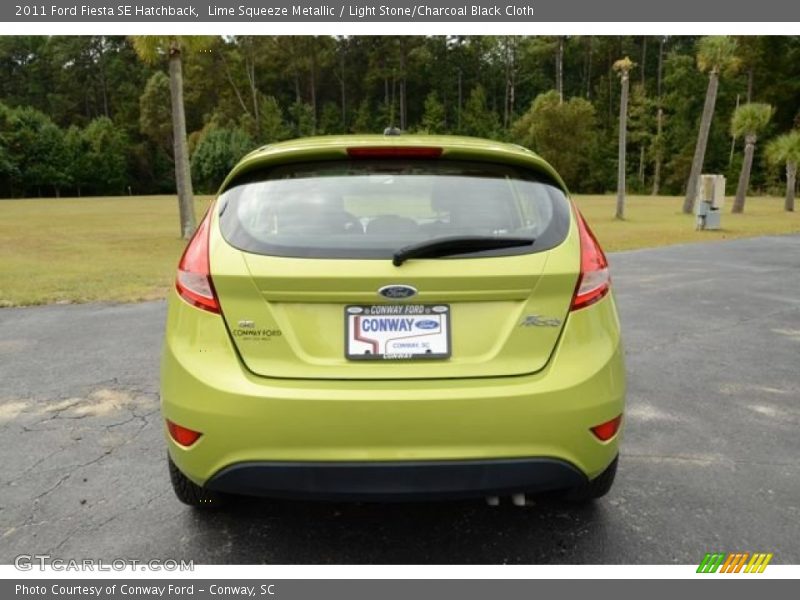 Lime Squeeze Metallic / Light Stone/Charcoal Black Cloth 2011 Ford Fiesta SE Hatchback