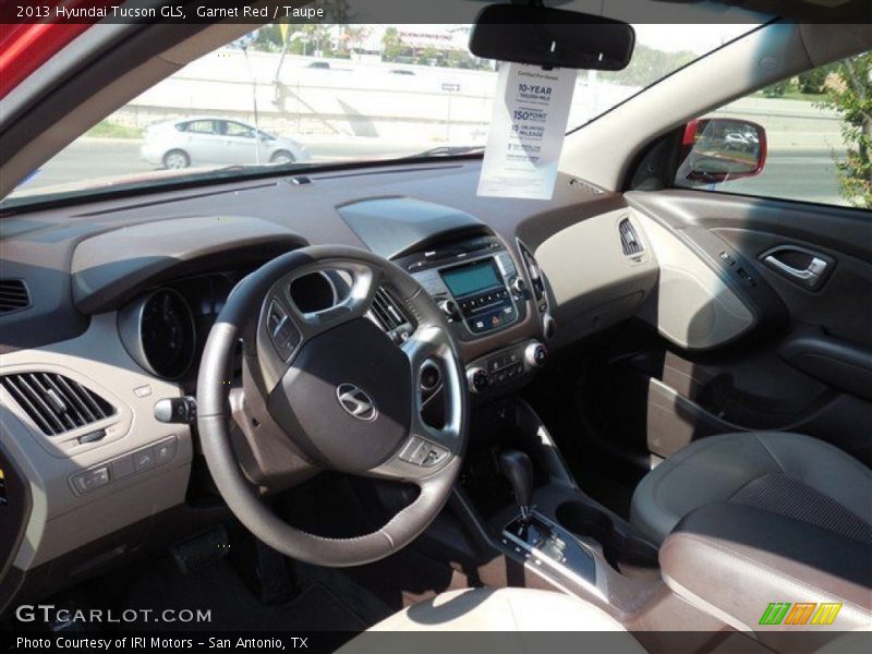 Garnet Red / Taupe 2013 Hyundai Tucson GLS