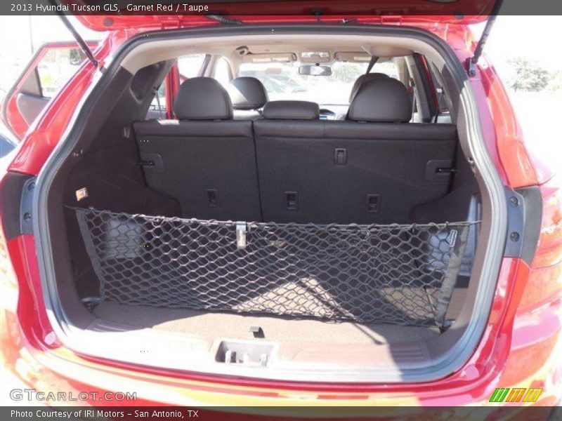 Garnet Red / Taupe 2013 Hyundai Tucson GLS