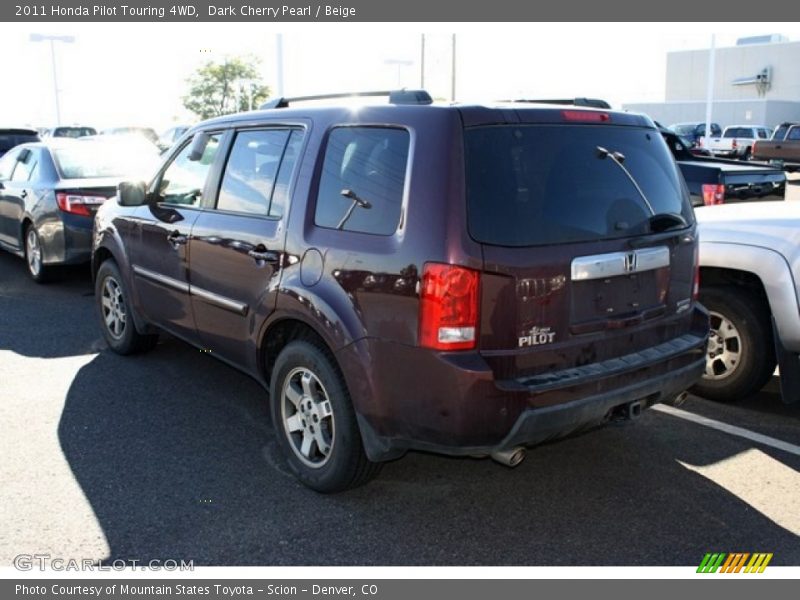 Dark Cherry Pearl / Beige 2011 Honda Pilot Touring 4WD