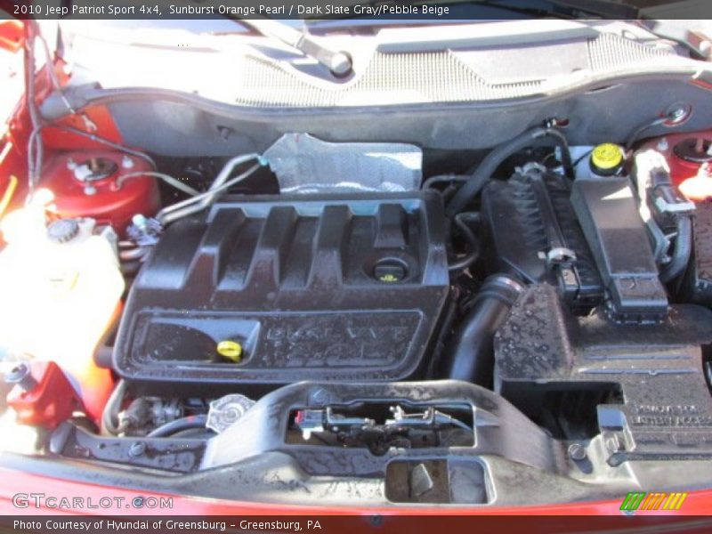 Sunburst Orange Pearl / Dark Slate Gray/Pebble Beige 2010 Jeep Patriot Sport 4x4