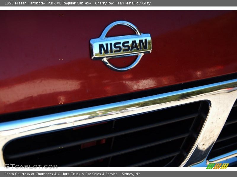 Cherry Red Pearl Metallic / Gray 1995 Nissan Hardbody Truck XE Regular Cab 4x4