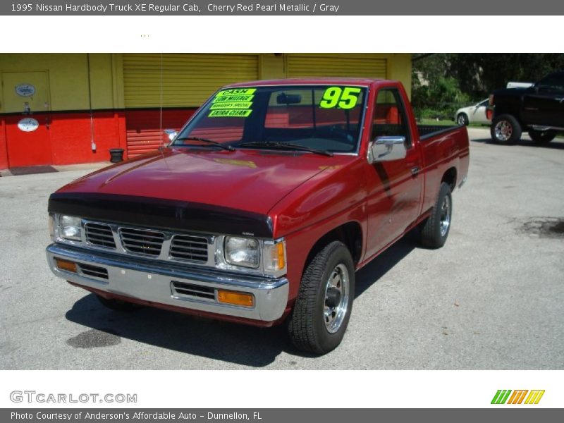 Cherry Red Pearl Metallic / Gray 1995 Nissan Hardbody Truck XE Regular Cab