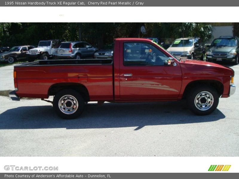 Cherry Red Pearl Metallic / Gray 1995 Nissan Hardbody Truck XE Regular Cab