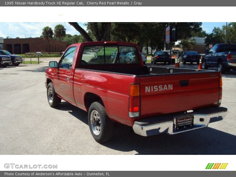 Cherry Red Pearl Metallic / Gray 1995 Nissan Hardbody Truck XE Regular Cab