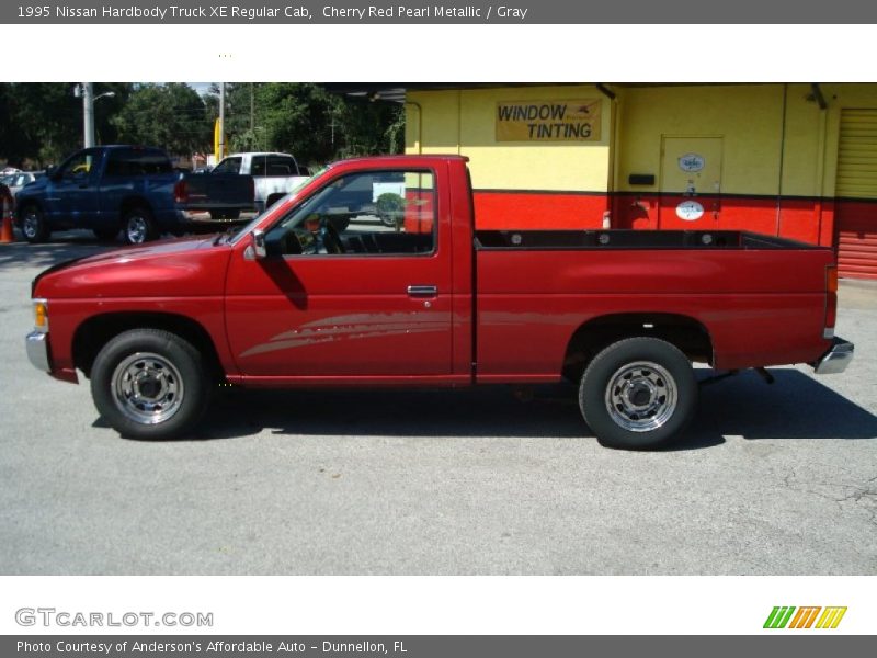 Cherry Red Pearl Metallic / Gray 1995 Nissan Hardbody Truck XE Regular Cab