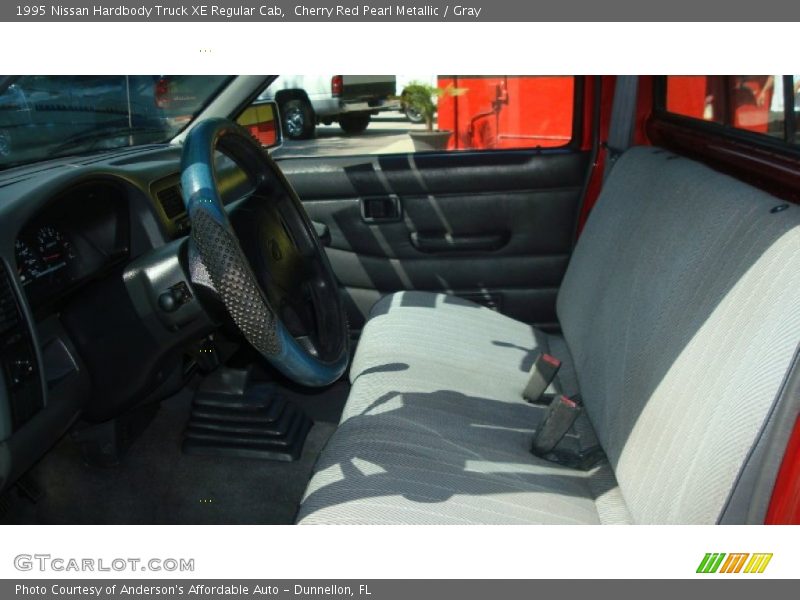 Cherry Red Pearl Metallic / Gray 1995 Nissan Hardbody Truck XE Regular Cab