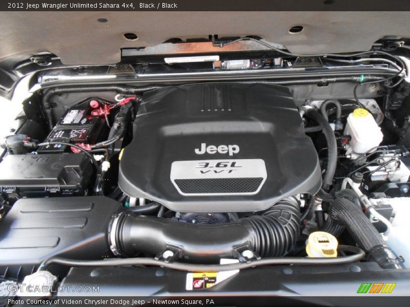 Black / Black 2012 Jeep Wrangler Unlimited Sahara 4x4
