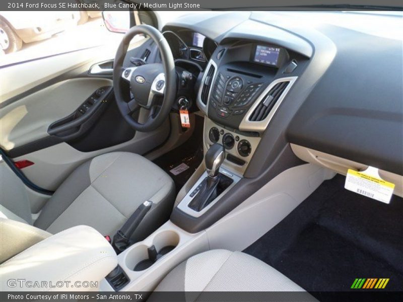Blue Candy / Medium Light Stone 2014 Ford Focus SE Hatchback
