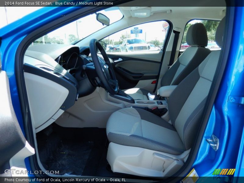 Blue Candy / Medium Light Stone 2014 Ford Focus SE Sedan