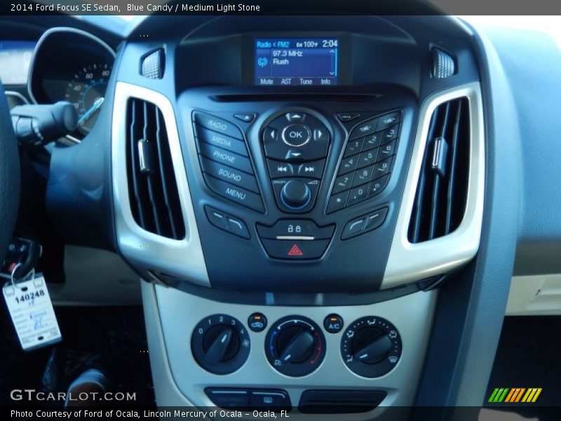 Blue Candy / Medium Light Stone 2014 Ford Focus SE Sedan