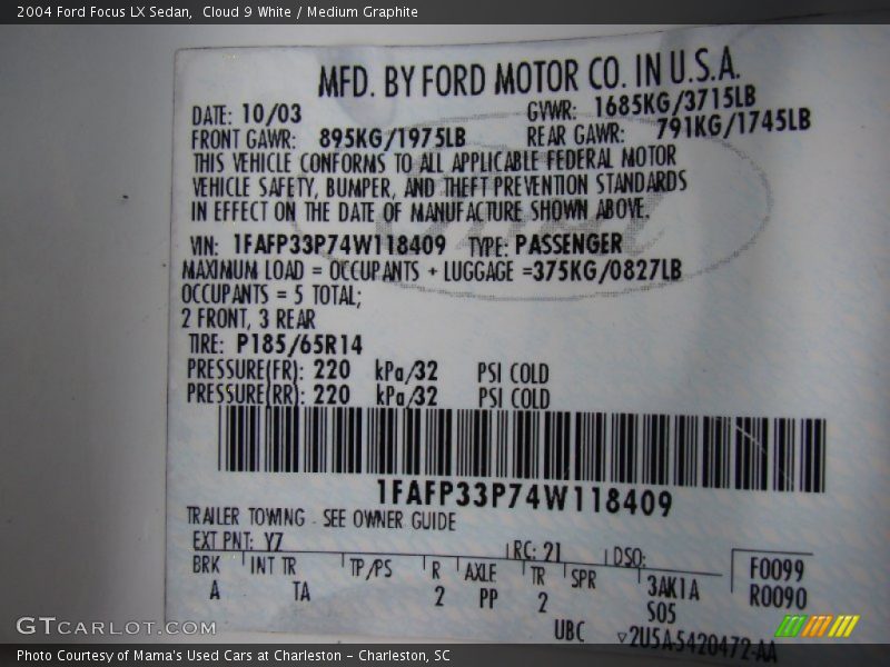 Cloud 9 White / Medium Graphite 2004 Ford Focus LX Sedan