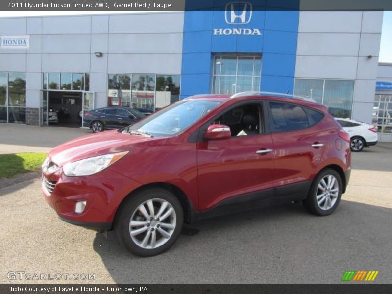 Garnet Red / Taupe 2011 Hyundai Tucson Limited AWD