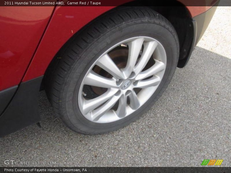 Garnet Red / Taupe 2011 Hyundai Tucson Limited AWD