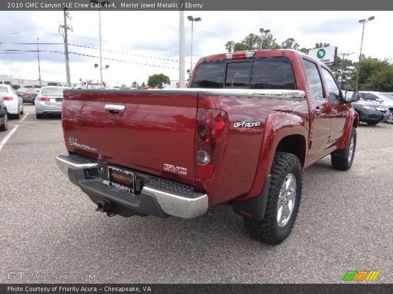 Merlot Jewel Metallic / Ebony 2010 GMC Canyon SLE Crew Cab 4x4