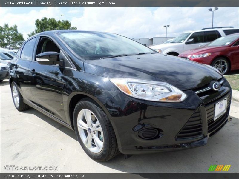 Tuxedo Black / Medium Light Stone 2014 Ford Focus SE Sedan